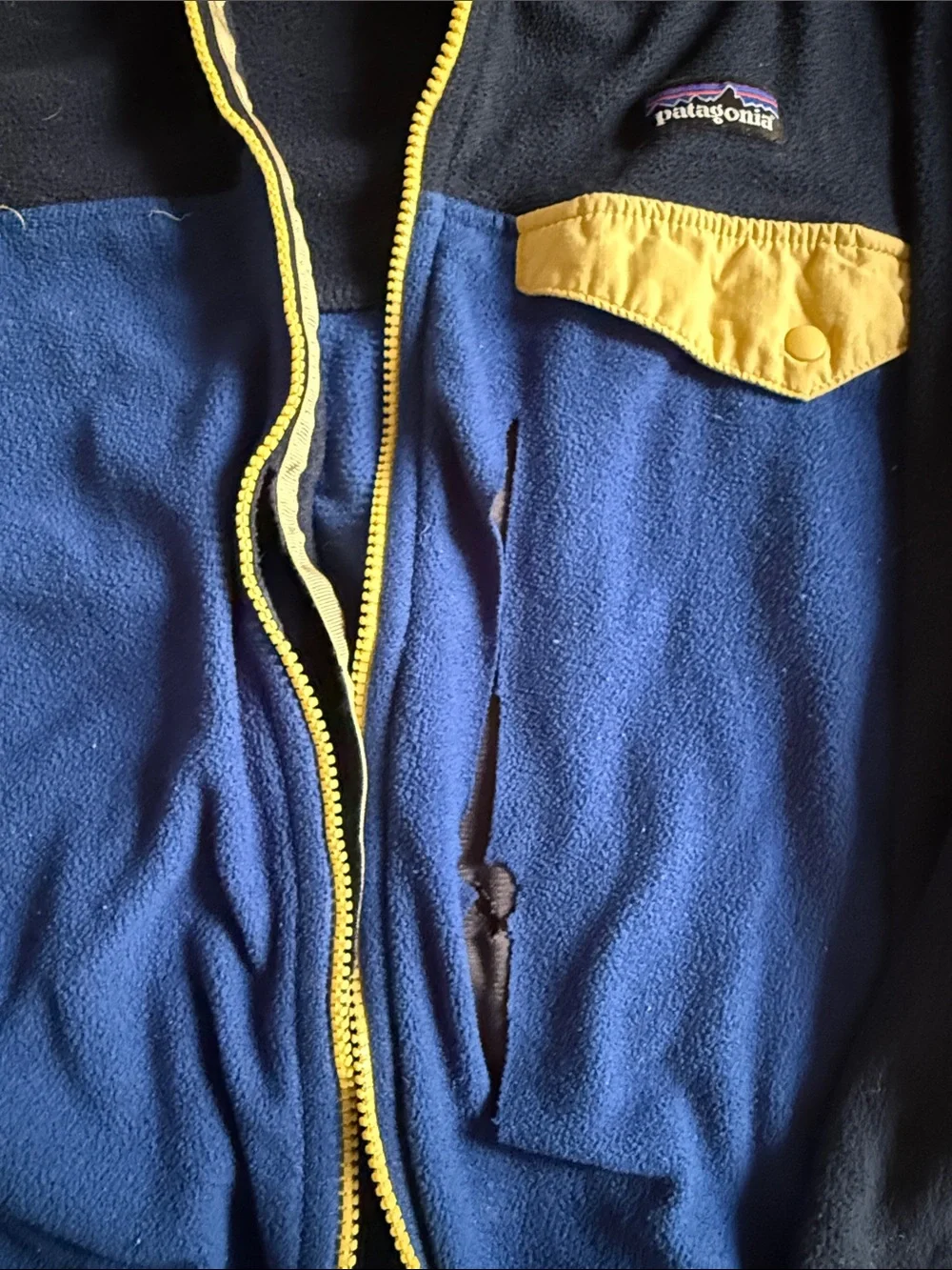 Patagonia Navy Blue Zip Fleece Hoodie with Yellow 7-8 well loved rips stains 💙💛